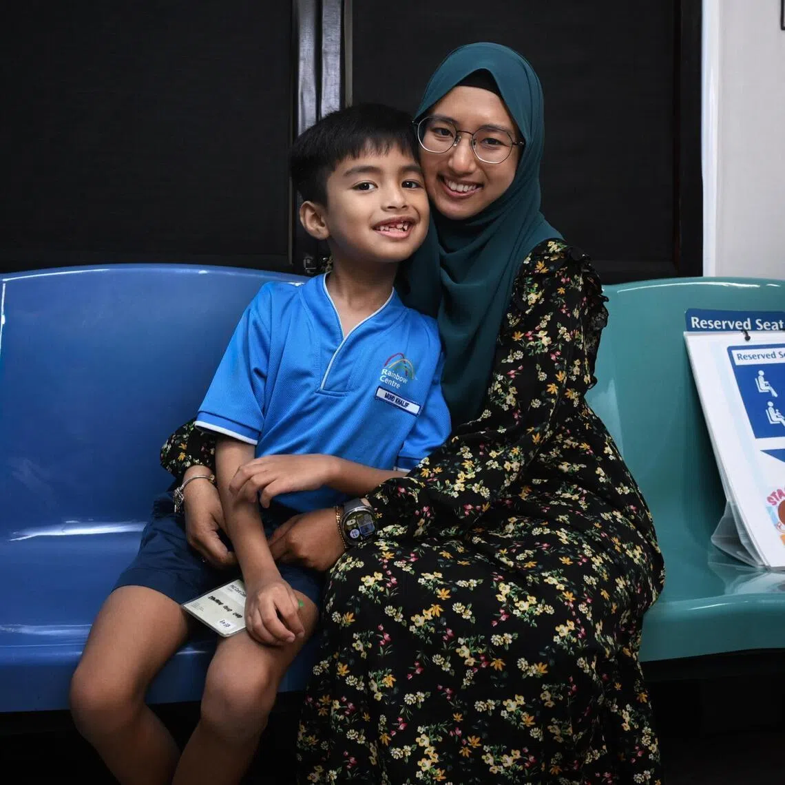 Muhammad Khalif Muhammad Khair Abdillah, 8, a student in the Junior Programme in Rainbow Centre Yishun Park School, and his mother, Nurhidayah Salleh, 33, on April 8, 2026.