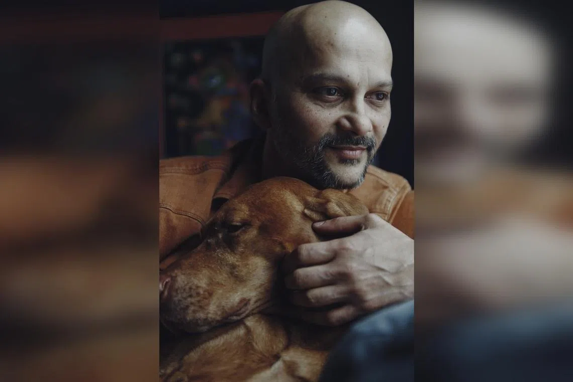 Dr Dhruv Kazi, a cardiologist and health economist who has written about the health benefits of owning pets, with his dog Rumi at home in Boston.