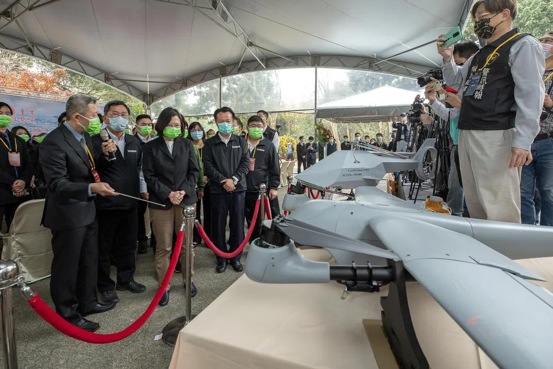 Taiwan President Tsai Ing-wen inspects a display of drones at an aerospace park of the National Chung-Shan Institute of Science and Technology in Chiayi, Taiwan, on Jan 22, 2021. 