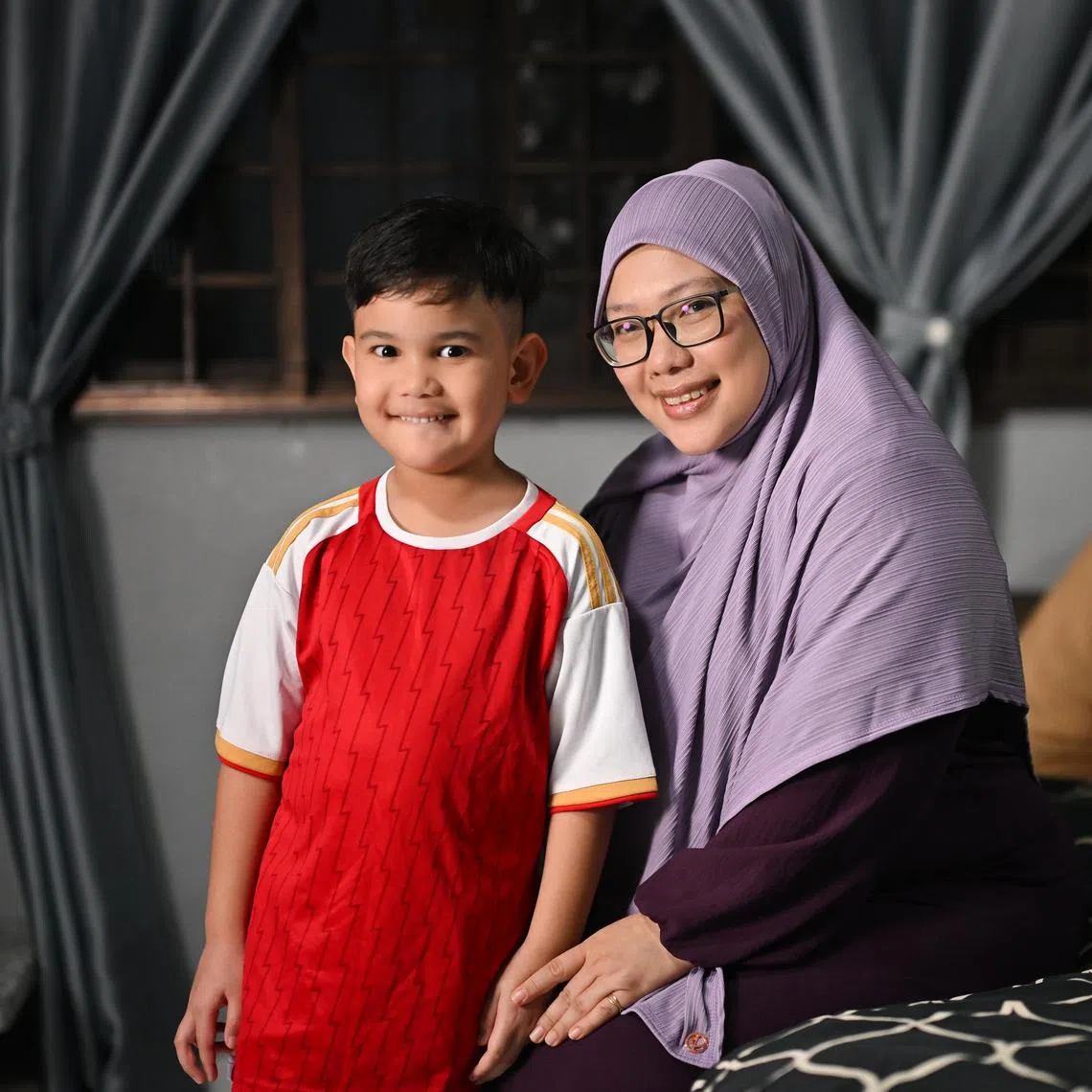 ST20250820-202587600854-Lim Yaohui-Theresa Tan-thacs/

Aafi Ezekiel Azli, 6, and his mother Madam Norardiana Nordin, 40, housewife, at home on Aug 20, 2025.

Madam Norardiana has enrolled Aafi in the ACS (Academy) for its first cohort that starts in January 2026.

(ST PHOTO: LIM YAOHUI)