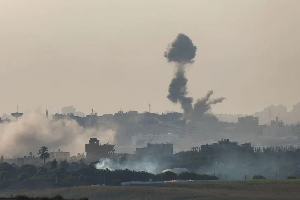 Smoke rises from an Israeli airstrike in the Gaza Strip, as seen from Israel, October 30, 2023. REUTERS/Amir Cohen