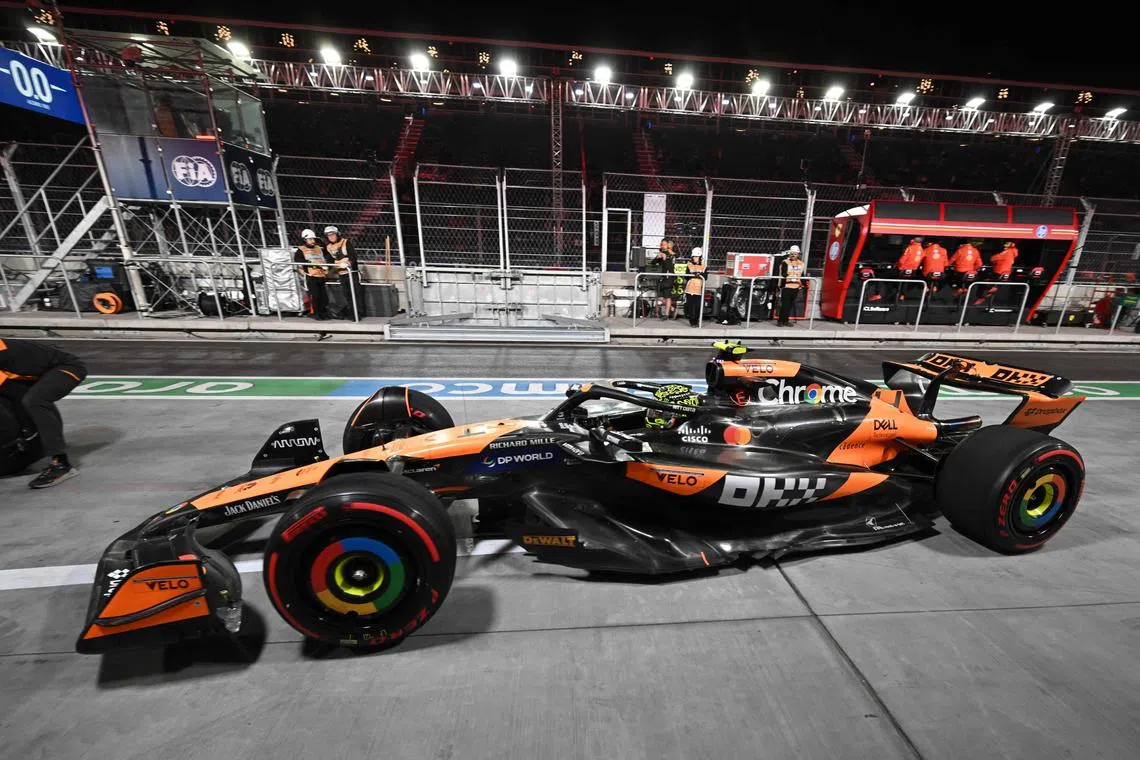 McLaren's Lando Norris makes a pit stop during the first practice session for the Las Vegas Grand Prix.