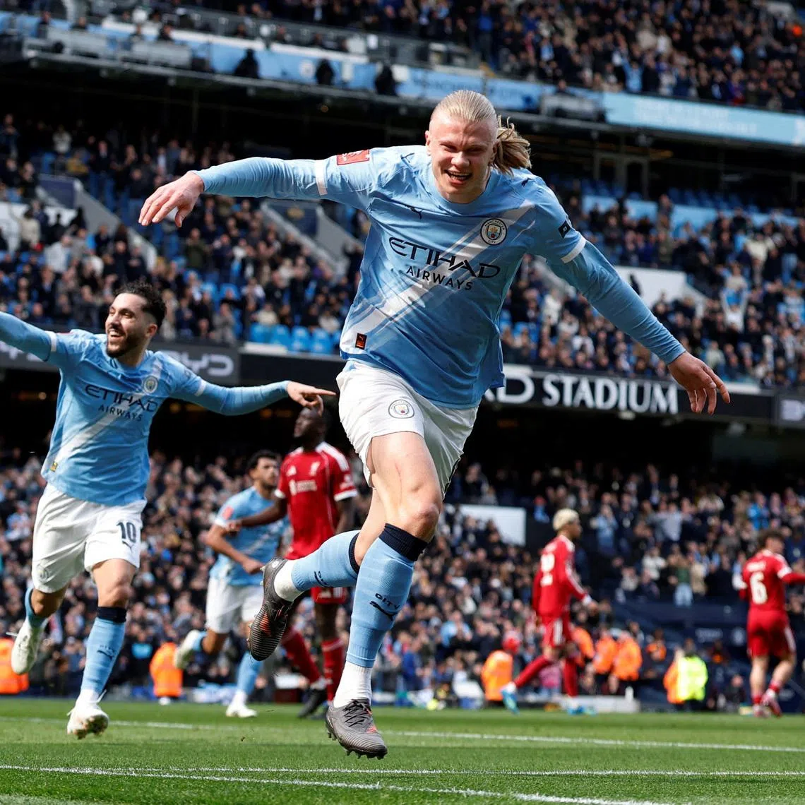 Soccer Football - FA Cup - Quarter Final - Manchester City v Liverpool - Etihad Stadium, Manchester, Britain - April 4, 2026 Manchester City's Erling Haaland celebrates scoring their first goal with Rayan Cherki Action Images via Reuters/Jason Cairnduff