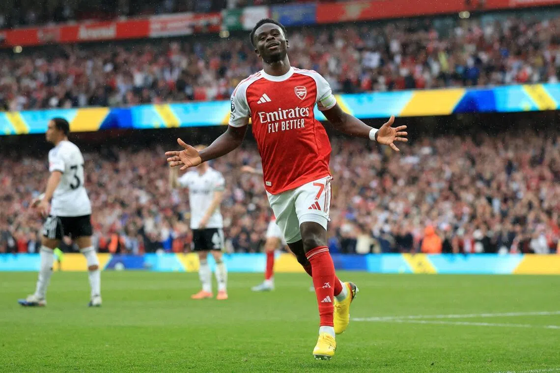 Arsenal's Bukayo Saka celebrates scoring their second goal in the 3-0 English Premier League win over Fulham at the Emirates Stadium in London on May 2, 2026.