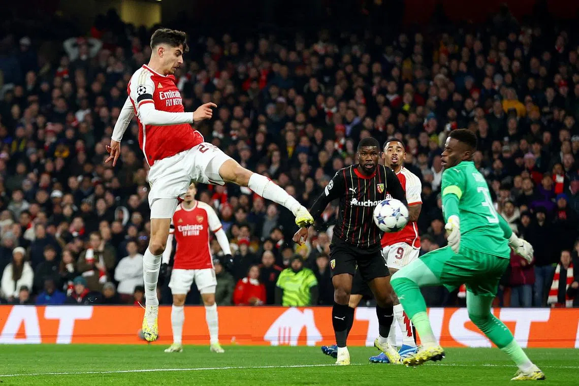 Arsenal's Kai Havertz scores their first goal in the 6-0 Champions League win over RC Lens.