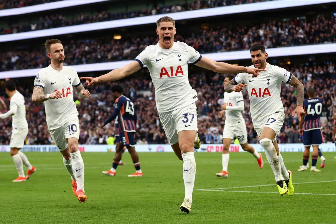 FILE PHOTO: Soccer Football - Premier League - Tottenham Hotspur v Nottingham Forest - Tottenham Hotspur Stadium, London, Britain - April 7, 2024  Tottenham Hotspur's Micky van de Ven celebrates scoring their second goal with James Maddison and Cristian Romero Action Images via Reuters/Matthew Childs/File Photo