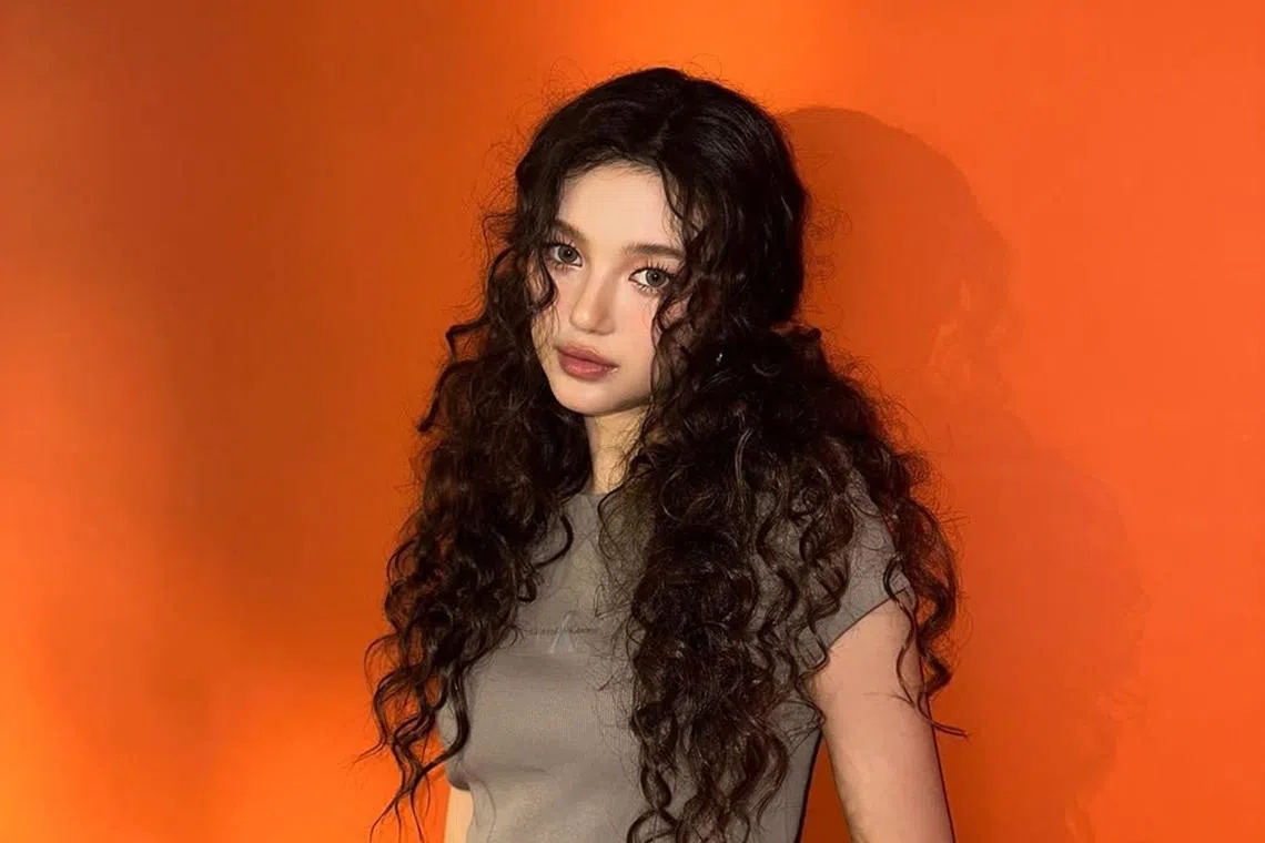 Ador announced on Dec 29 the termination of its exclusive contract with NewJeans member Danielle.