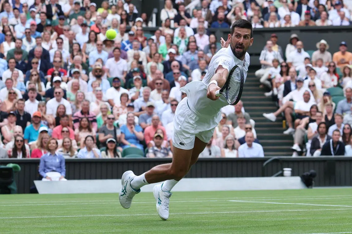Tennis - Wimbledon - All England Lawn Tennis and Croquet Club, London, Britain - July 5, 2025 Serbia's Novak Djokovic's in action during his third round match against Serbia's Miomir Kecmanovic REUTERS/Toby Melville