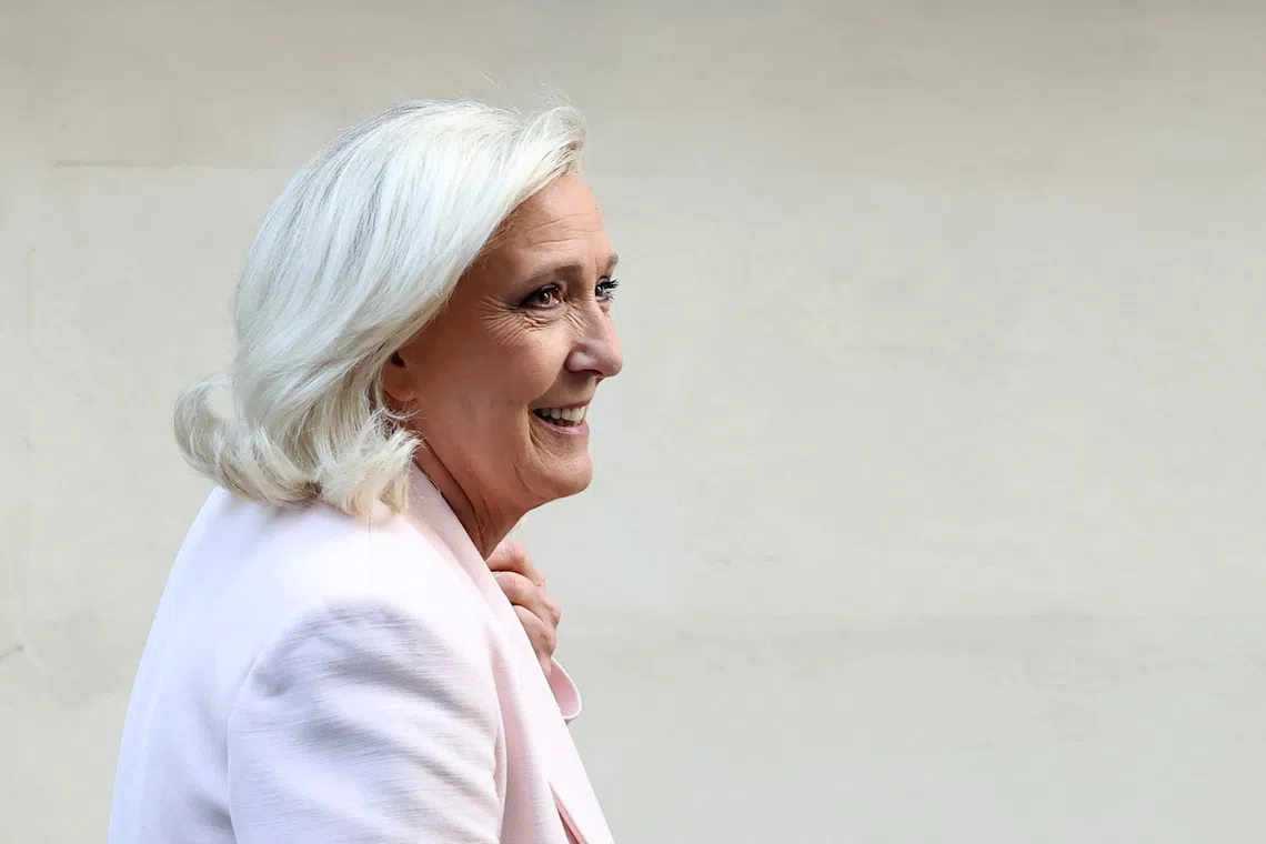 French far-right leader Marine Le Pen, member of parliament for the Rassemblement National (National Rally - RN) party, leaves after a party meeting at the Rassemblement National headquarters in Paris, France, July 7, 2026. REUTERS/Stephane Mahe