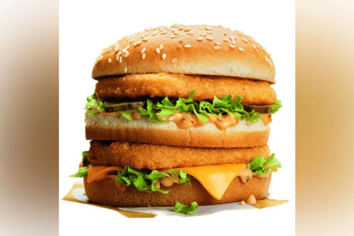 The chicken version of the "Big Mac" features two chicken patties, special sauce, lettuce, cheese, and pickles on a sesame seed bun.