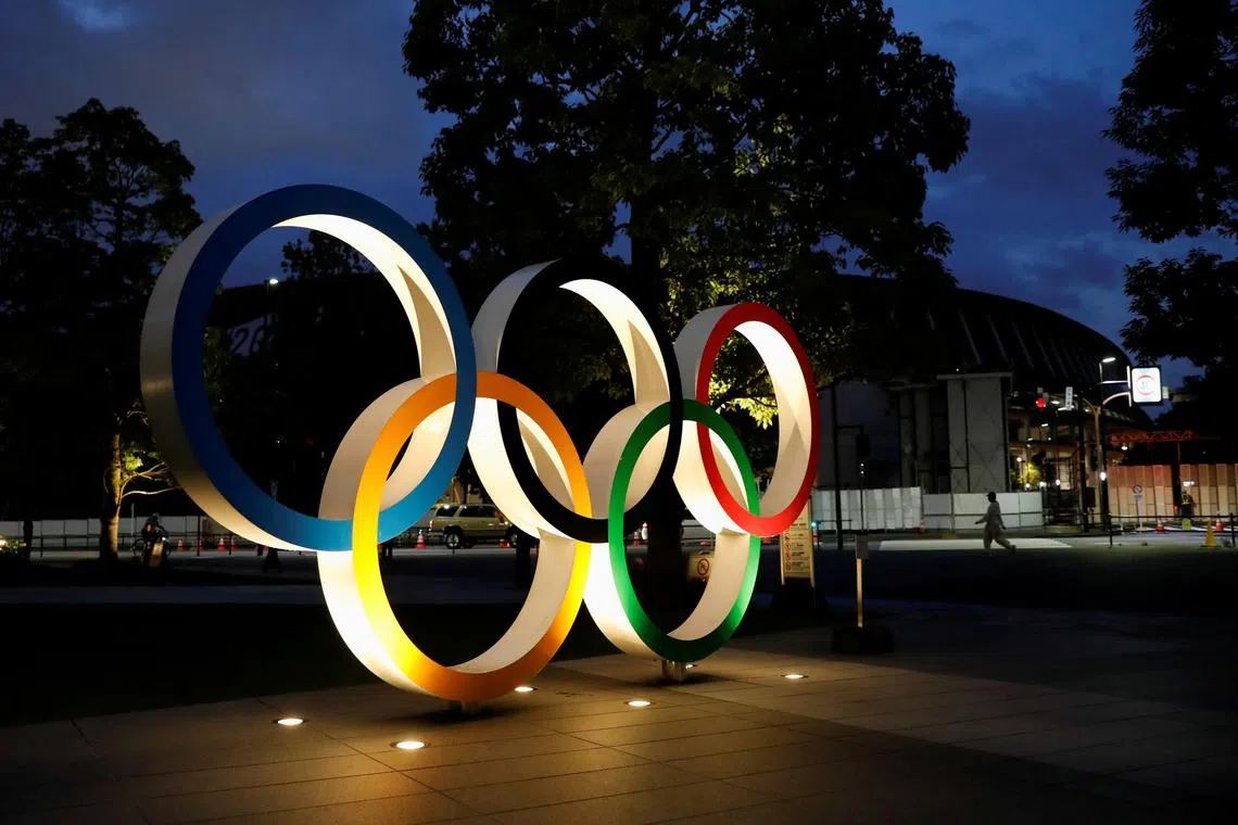 FILE PHOTO: The Olympic Rings monument is seen outside the Japan Olympic Committee (JOC) headquarters near the National Stadium in Tokyo, Japan June 23, 2021.REUTERS/Issei Kato/File Photo