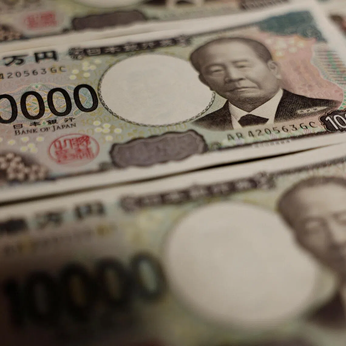 The yen rose to 156.81 per US dollar on Oct 23 and strengthened to approximately 122.71 per Singapore dollar.
