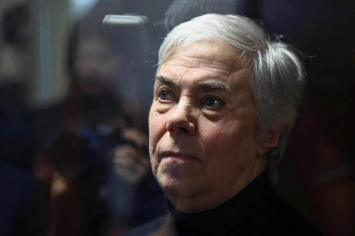 FILE PHOTO: Nadezhda Buyanova, a 68-year-old paediatrician denounced by a patient's mother for an alleged unpatriotic statement and accused of blaming Russia's armed forces for a military conflict against Ukraine, stands inside an enclosure for defendants during a court hearing in Moscow, Russia November 12, 2024. REUTERS/Evgenia Novozhenina/File Photo