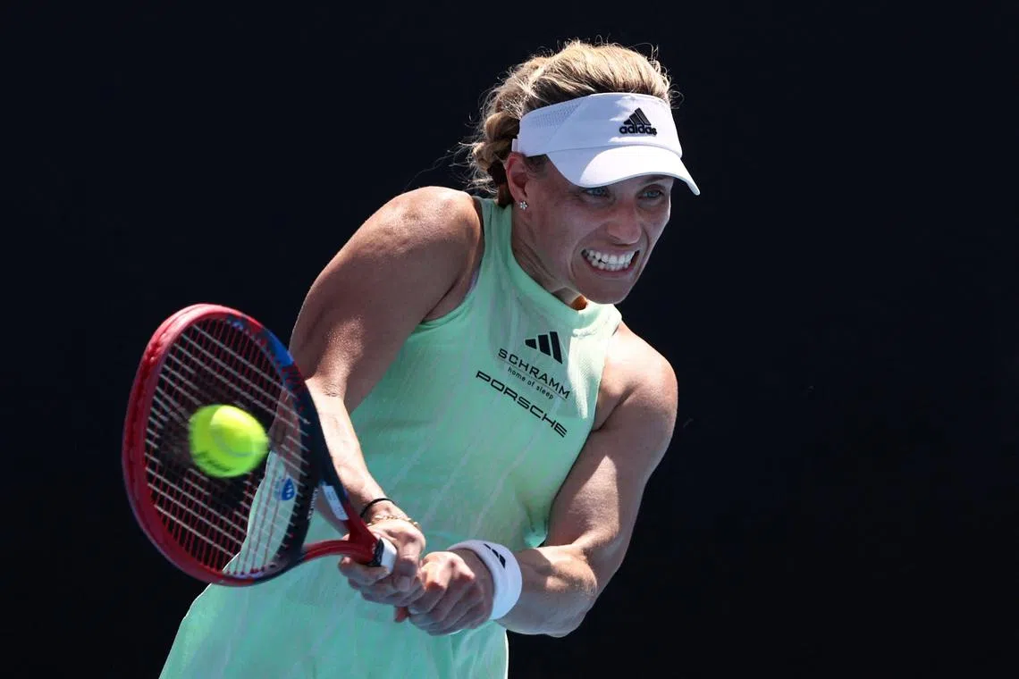 Germany's Angelique Kerber hits a return against American Danielle Collins during the first round of the Australia Open.