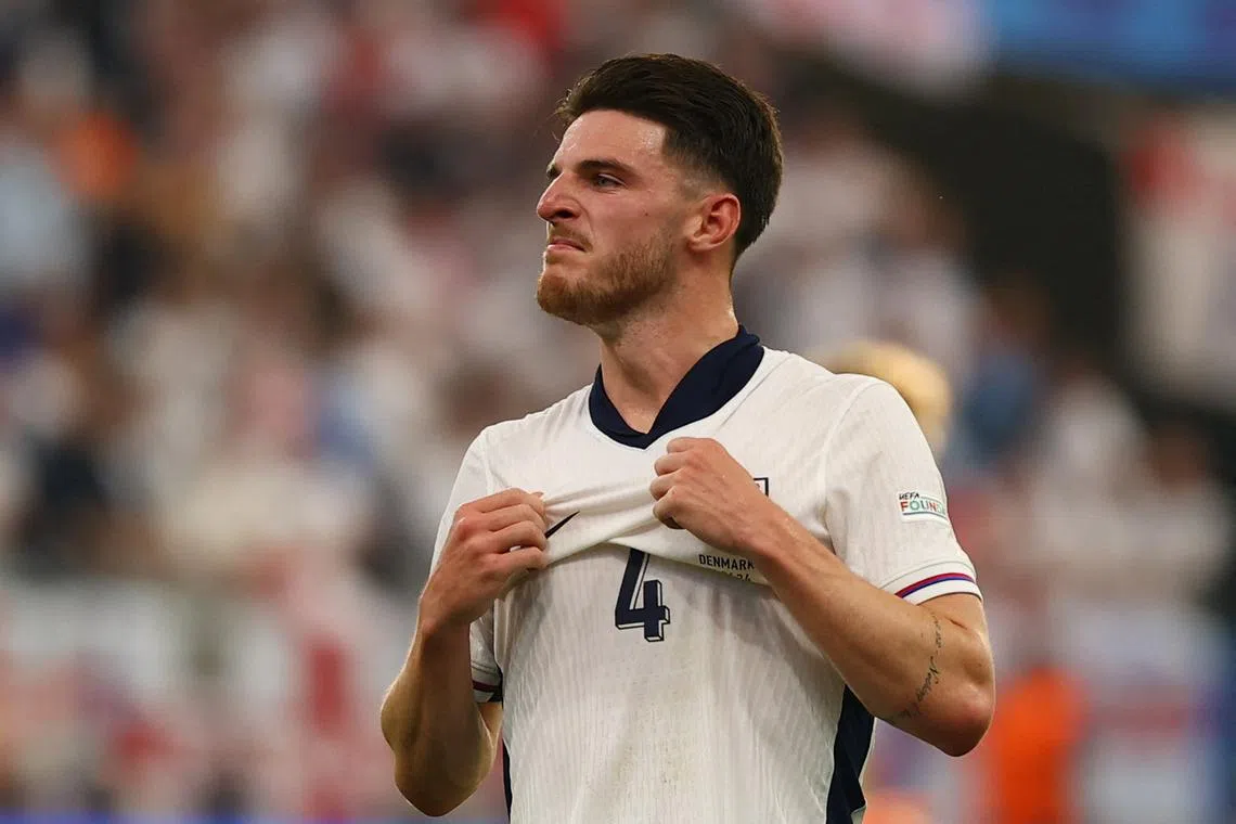 Soccer Football - Euro 2024 - Group C - Denmark v England - Frankfurt Arena, Frankfurt, Germany - June 20, 2024 England's Declan Rice reacts REUTERS/Kai Pfaffenbach