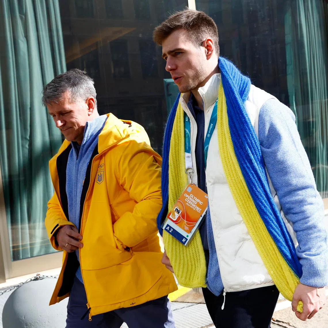Milano Cortina 2026 Winter Olympics - Skeleton - Vladyslav Heraskevych of Ukraine appears before the Court of Arbitration for Sport - Hilton Milan, Milan, Italy - February 13, 2026 Vladyslav Heraskevych of Ukraine and his father and coach, Mykhailo Heraskevych after appearing before Court of Arbitration for Sport following his disqualification from the Milano Cortina 2026 Winter Olympics for wearing a helmet in tribute to athletes who have died amid Russia's attack on Ukraine REUTERS/Alessandro Garofalo