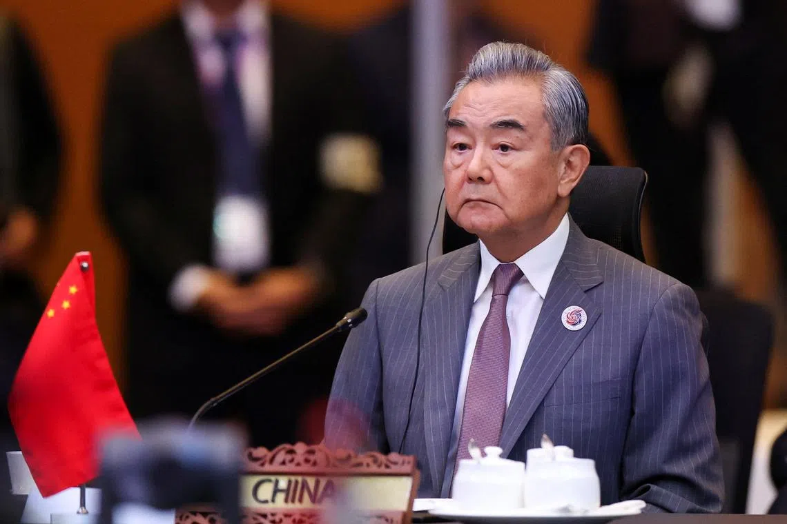 FILE PHOTO: Chinese Foreign Minister Wang Yi attends the 26th ASEAN Plus Three Foreign Ministers' Meeting at the Kuala Lumpur Convention Centre in Kuala Lumpur, Malaysia, July 10, 2025. REUTERS/Hasnoor Hussain/Pool/File Photo