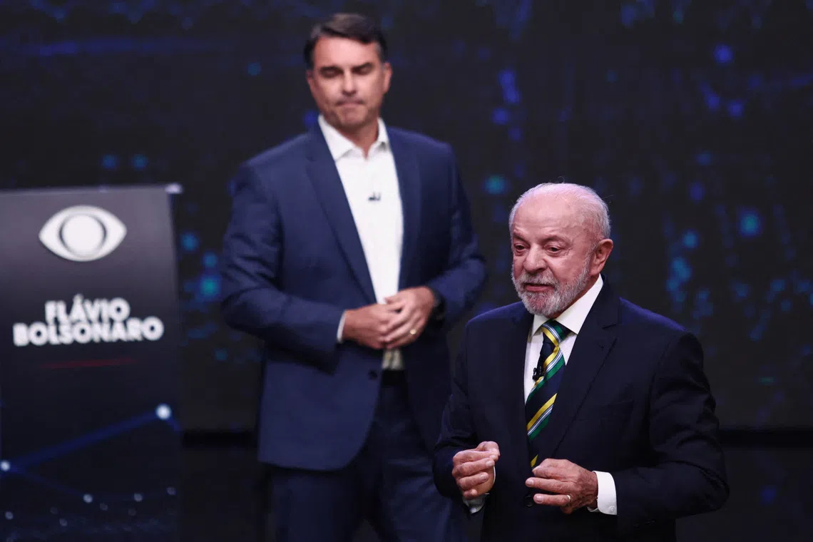 Brazilian presidential candidates Flavio Bolsonaro and Luiz Inacio Lula da Silva attend a presidential debate, ahead of the runoff presidential election, in Sao Paulo, Brazil, October 18, 2026. REUTERS/Jean Carniel
