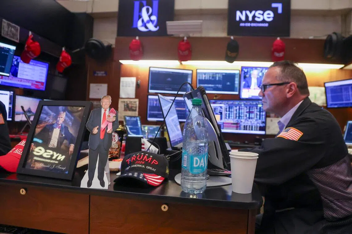 A trader working on the floor of the New York Stock Exchange, in New York City, on Aug 28.