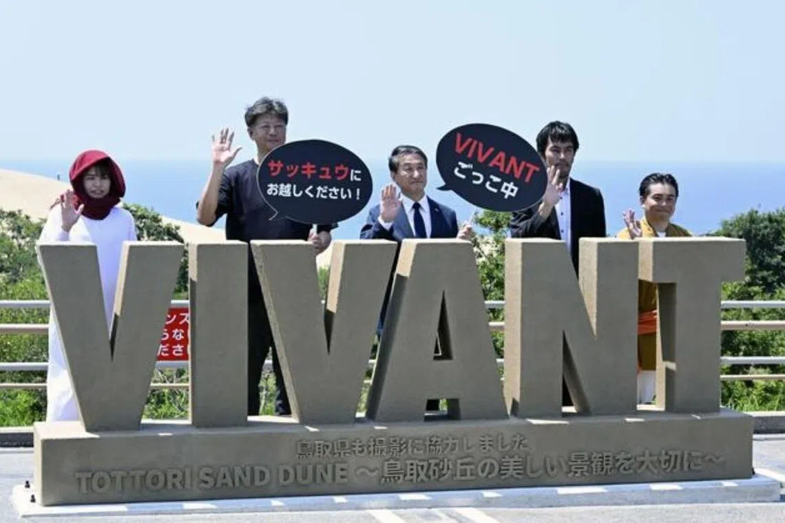A logo of hit Japanese TV spy thriller Vivant, made of sand, as a photo spot at the famous Tottori Sand Dunes.