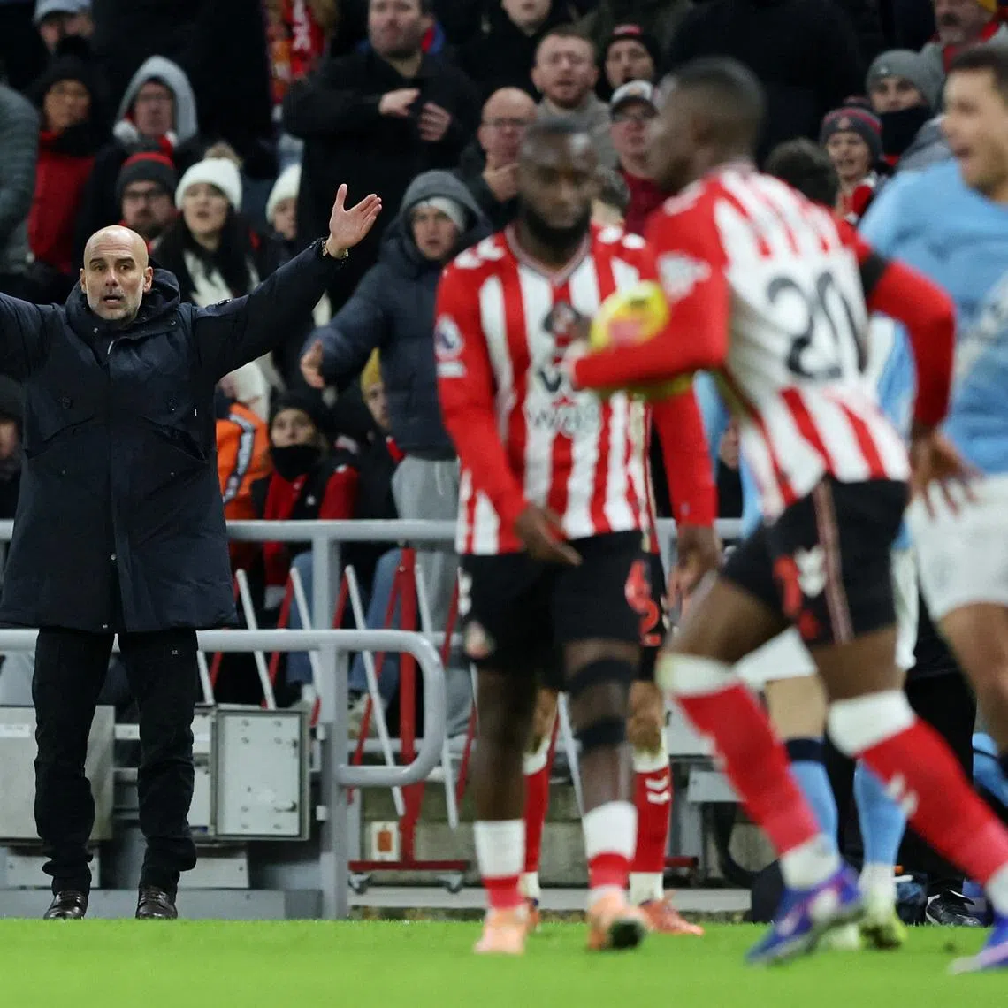 Soccer Football - Premier League - Sunderland v Manchester City - Stadium of Light, Sunderland, Britain - January 1, 2026 Manchester City manager Pep Guardiola reacts. REUTERS/Scott Heppell