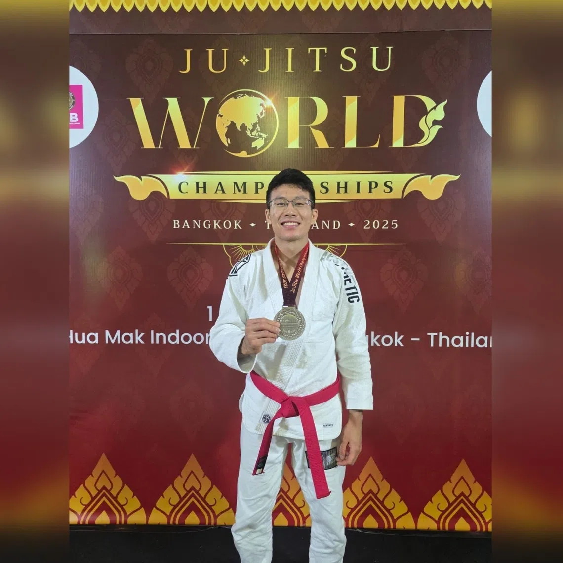 Singapore's Noah Lim posing with the silver medal that he won at the Ju-jitsu International Federation World Championships on Nov 4.
