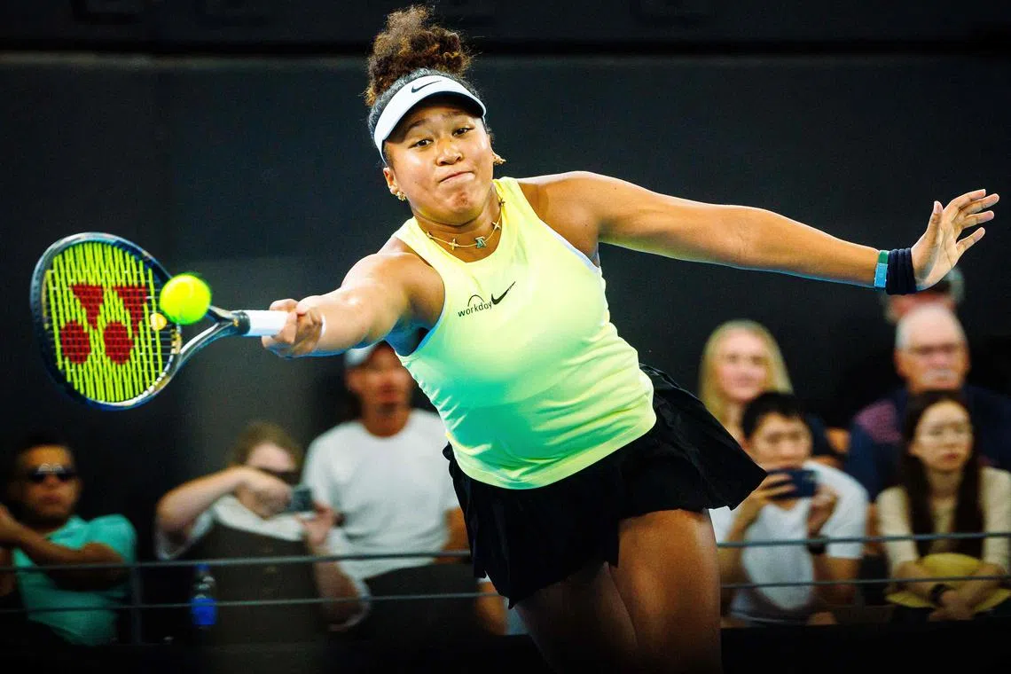 Naomi Osaka hits a return during her match against Karolina Pliskova at the Brisbane International.