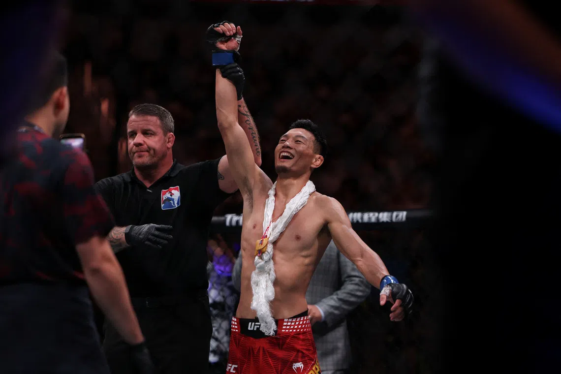 UFC flyweight fighter Su Mudaerji, celebrates after defeating Alex Perez in the Octagon during a UFC event in Shanghai, China, August 29, 2026. REUTERS/Go Nakamura
