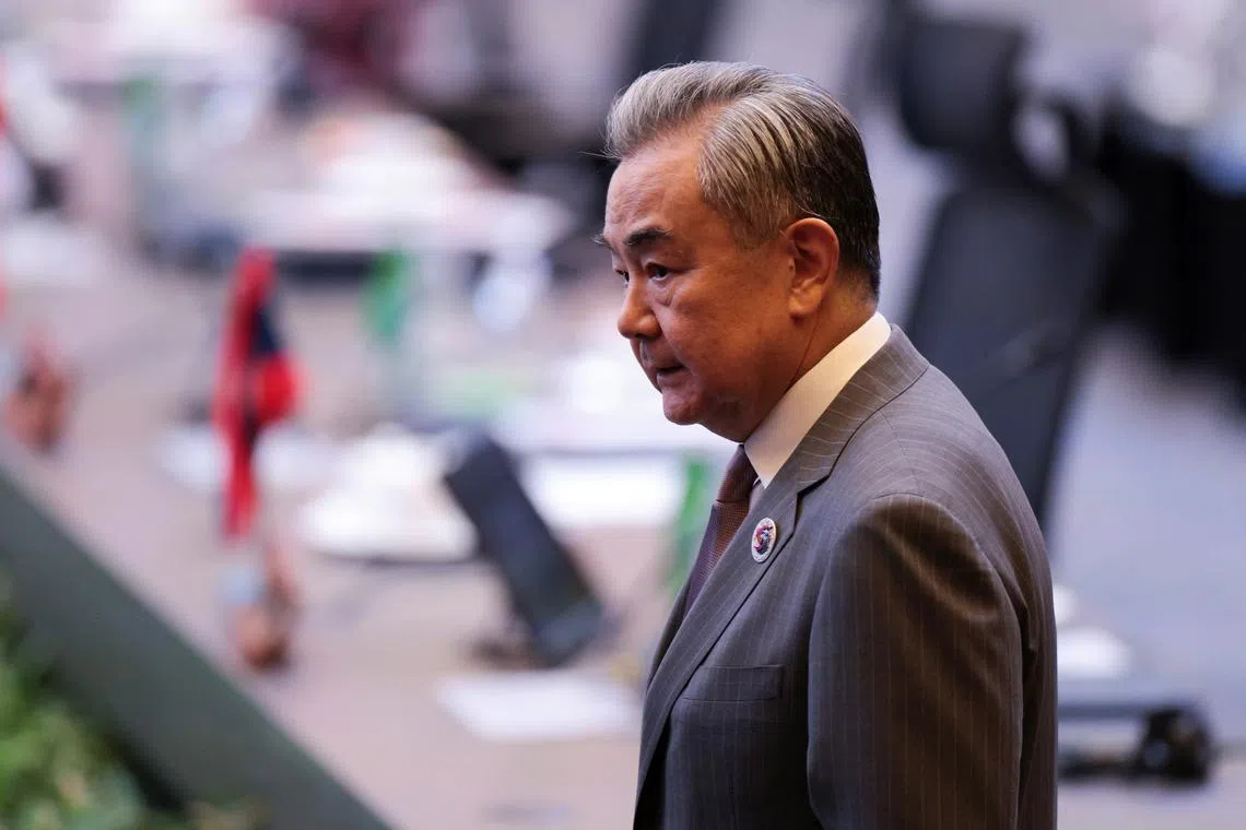 FILE PHOTO: Chinese Foreign Minister Wang Yi attend the 26th ASEAN Plus Three Foreign Ministers' Meeting at the Kuala Lumpur Convention Centre in Kuala Lumpur, Malaysia, July 10, 2025. REUTERS/Hasnoor Hussain/Pool/File Photo