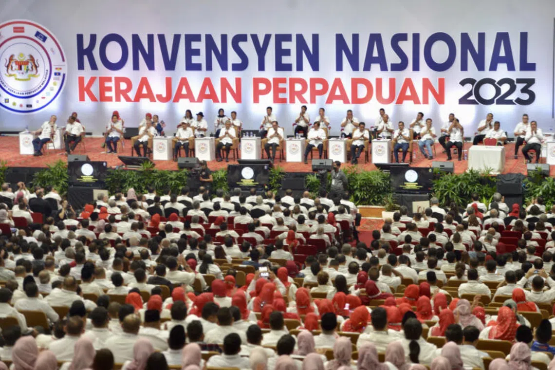 PM Anwar Ibrahim (on stage, centre) at the inaugural Unity Government National Convention at Umno's headquarters.