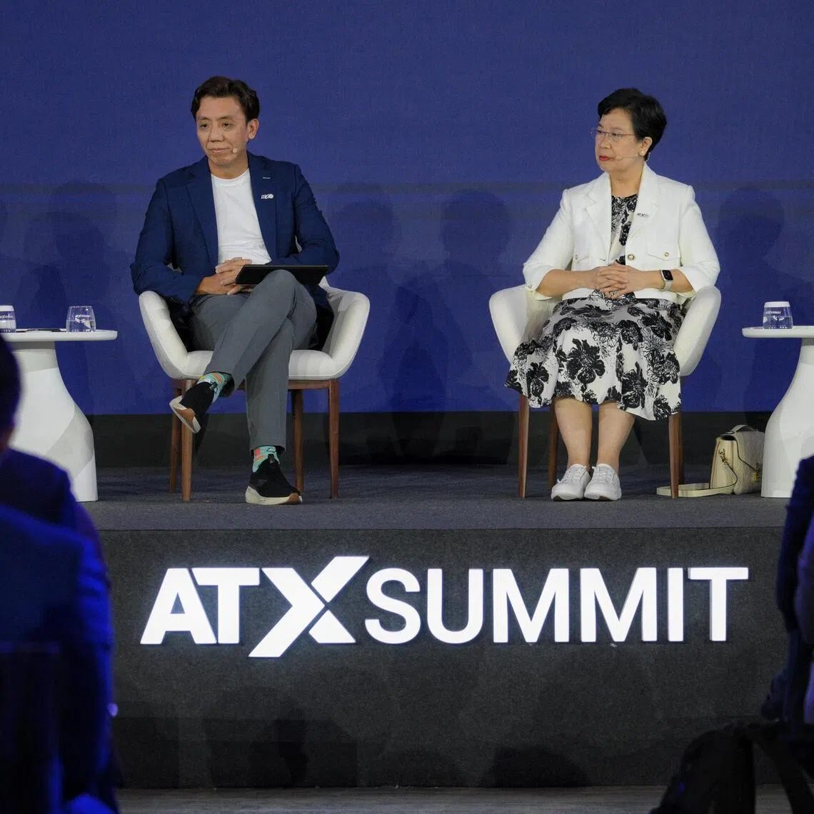 The panel discussion on the future of work in an AI-powered world was moderated by Yvonne Lim, cluster director for Asia Tech x Programme Office and Digital Industry Singapore at Infocomm Media Development Authority. Panellists include Acting Minister for Transport and Senior Minister of State for Finance Jeffrey Siow, Singapore Management University's president Professor Lily Kong, Singtel Singapore's chief executive Ng Tian Chong.