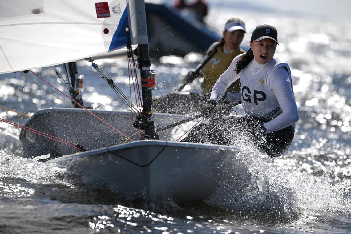 Jania Ang of Singapore reacts as she crosses the finish during the Women?s Dinghy ILCA 6 final at the Kaiyoh Yacht Harbour on Oct 2, 2026.