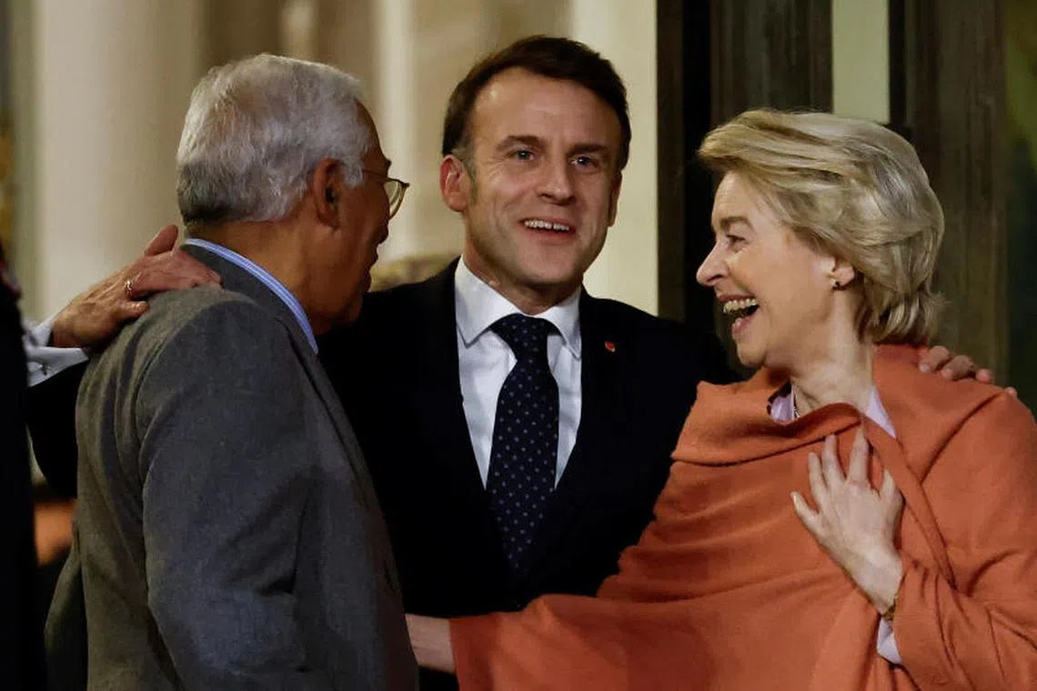 French President Emmanuel Macron, European Council President Antonio Costa and European Commission President Ursula von der Leyen react following a meeting with European leaders on Ukraine and European security at the Elysee Palace in Paris, France, February 17, 2025. REUTERS/Abdul Saboor
