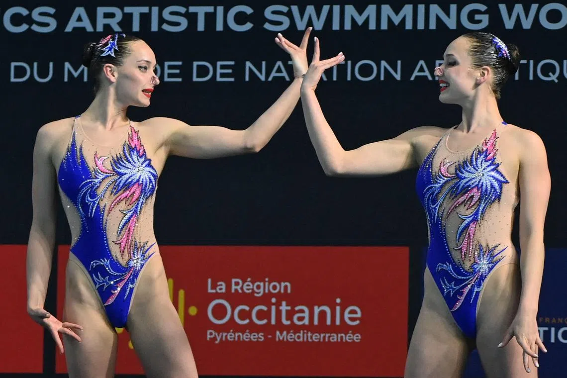 Ukraine's Maryna Aleksiiva and Vladyslava Aleksiiva compete in the World Cup in Montpellier.