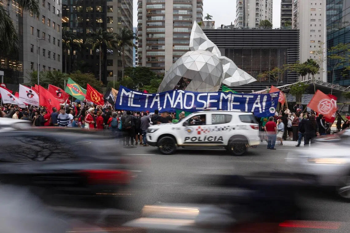 Supporters of Brazilian President Luiz Inacio Lula da Silva protest outside the headquarters of tech giant Meta in Sao Paulo, Brazil, on Oct 19.
