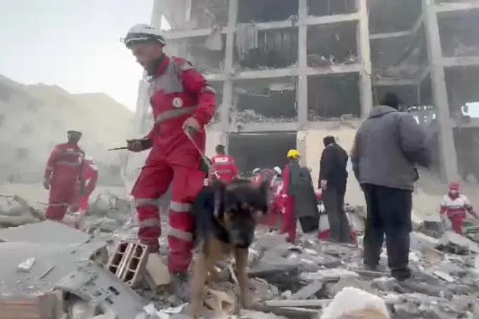 Rescuers work in the rubble of residential buildings after air strikes, in the Resalat neighbourhood, in Tehran, Iran.