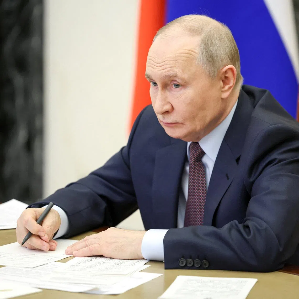 Russian President Vladimir Putin chairs a meeting with members of the government via video link at the Kremlin in Moscow, Russia, April 23, 2026. Sputnik/Alexander Kazakov/Pool via REUTERS/File Photo