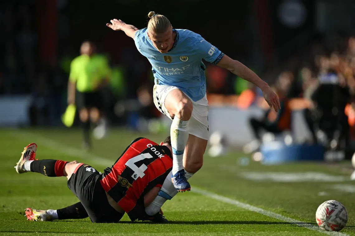 Erling Haaland (right) picked up the injury during City's March 30 FA Cup quarter-final win at Bournemouth.
