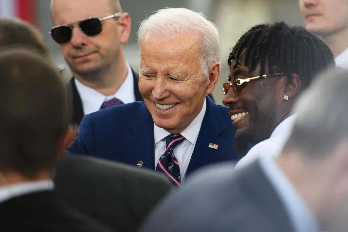 US President Joe Biden speaks to members of the crowd after a visit to Wolfspeed, a semiconductor manufacturer, in Durham, North Carolina. PHOTO: AFP