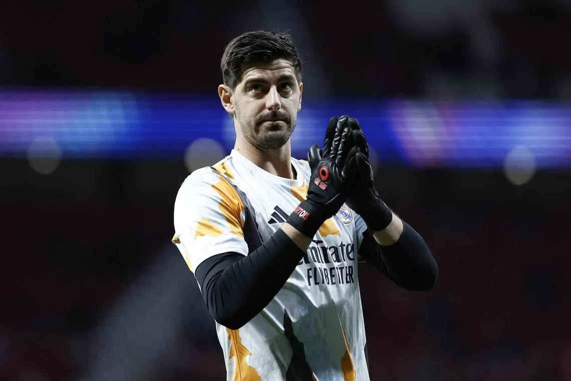 FILE PHOTO: Soccer Football - Champions League - Round of 16 - Second Leg - Atletico Madrid v Real Madrid - Metropolitano, Madrid, Spain - March 12, 2025 Real Madrid's Thibaut Courtois during the warm up before the match REUTERS/Juan Medina/File Photo