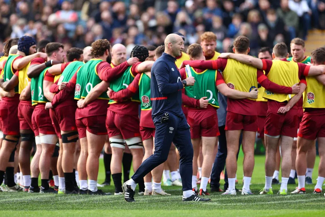FILE PHOTO: Rugby Union - Six Nations Championship - England Training - Twickenham Stadium, London, Britain - February 16, 2024  England head coach Steve Borthwick looks on as the players huddle during training Action Images via Reuters/Andrew Boyers