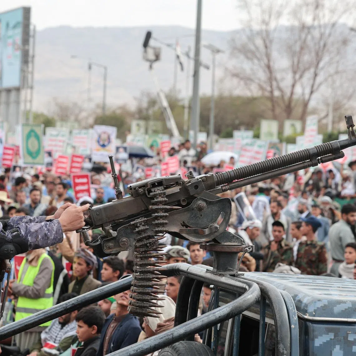 FILE PHOTO: A member of Houthi security force mans a machine gun mounted on the back of a patrol truck as Houthi supporters rally against the Saudi-led coalition's restrictions on Houthi-controlled areas, which the group describes as a blockade, in Sanaa, Yemen, July 17, 2026. REUTERS/Khaled Abdullah/ File Photo