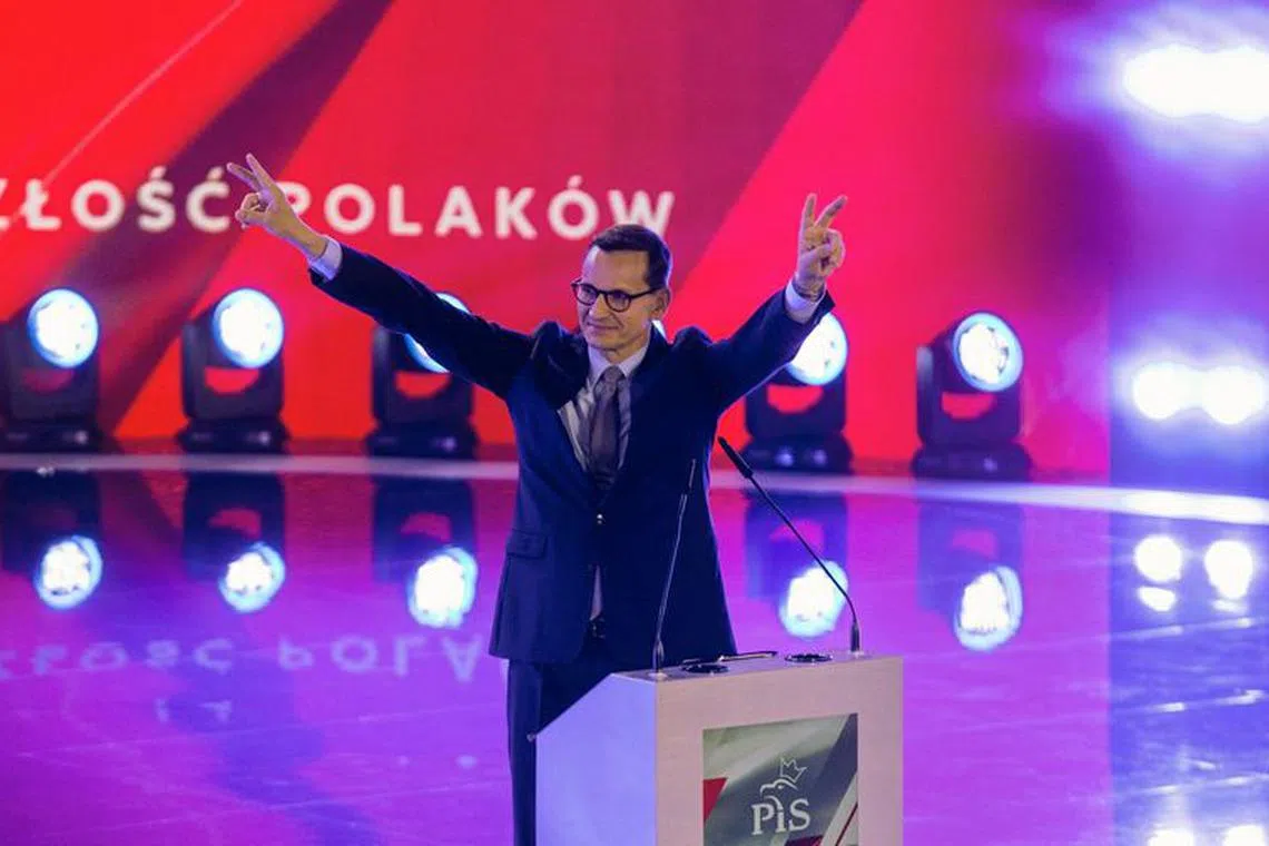 FILE PHOTO: Polish Prime Minister Mateusz Morawiecki gestures during a Law and Justice (PiS) party convention, ahead of the country's parliamentary election, in Katowice, Poland October 1, 2023. Agencja Wyborcza.pl/Grzegorz Celejewski via REUTERS/File photo