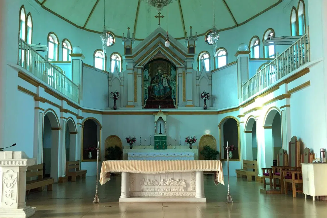 FILE PHOTO: The altar and a painting of the Virgin Mary, known locally as Our Lady of China, are seen at Our Lady of China Catholic Church in Donglu village, Hebei province, China October 3, 2018. REUTERS/Christian Shepherd/File Photo