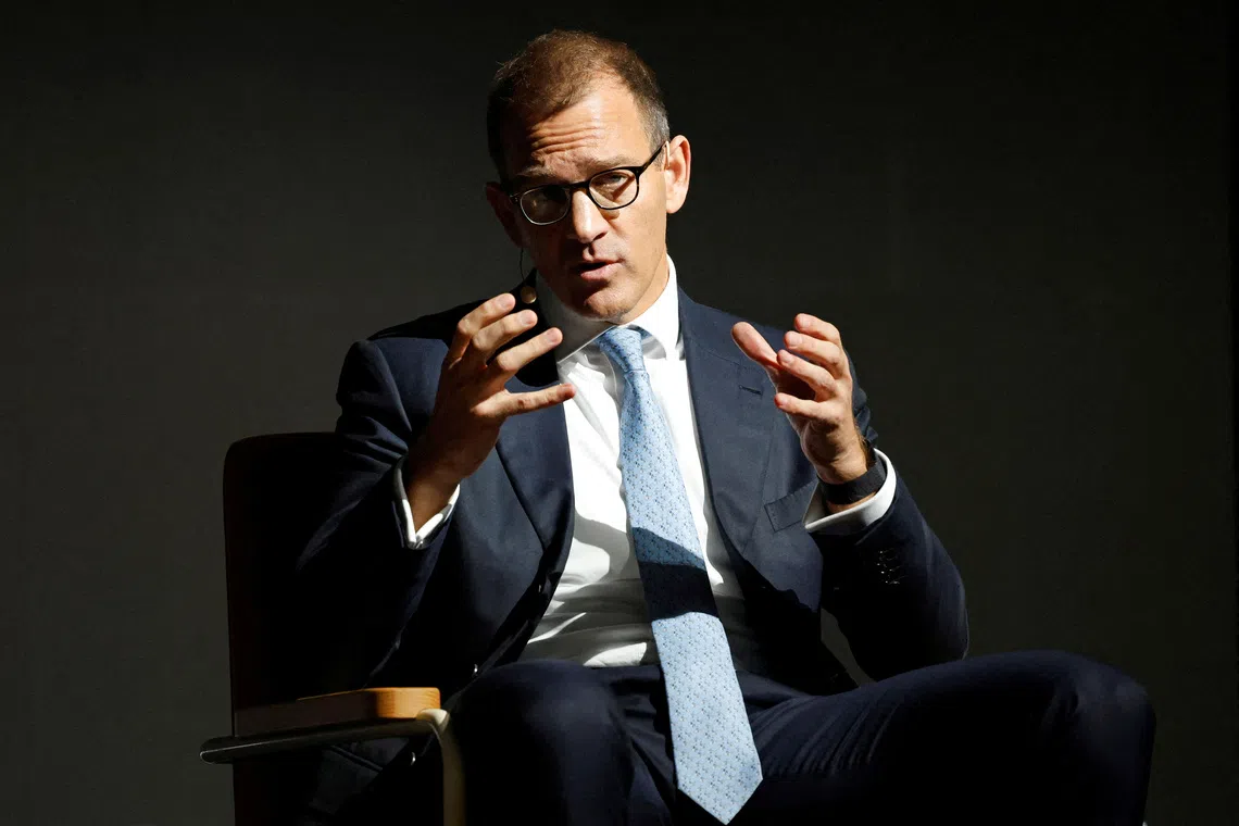 FILE PHOTO: Czech businessman Daniel Kretinsky speaks at a conference in Prague, Czech Republic, October 17, 2023.    REUTERS/David W Cerny/File Photo