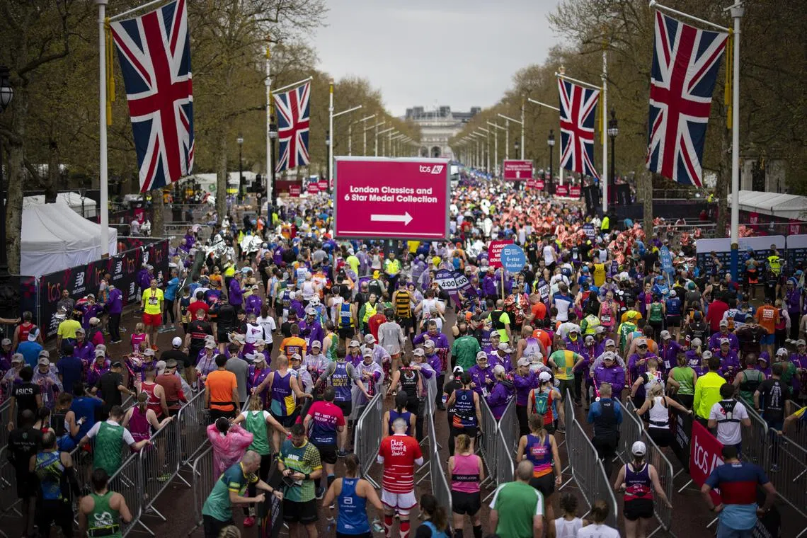 Riunners at the London Marathon finish line on April 23, 2023. Over 48,000 completed the race.