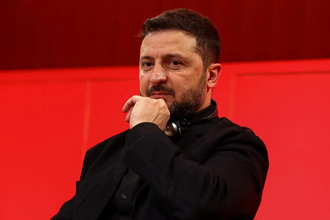 Ukrainian President Volodymyr Zelenskiy attends a panel at Sciences Po university, in Paris, France, March 13, 2026.REUTERS/Abdul Saboor