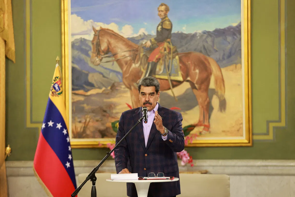 Venezuela's President Nicolas Maduro speaks on the day he signs into law a national defense framework approved by Venezuela's National Assembly, ordering the immediate activation of \"integral defense commands\" to unify civilian and military forces, according to state television, in Caracas, Venezuela, November 11, 2025. Miraflores Palace/Handout via REUTERS