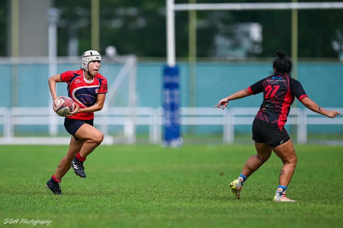 Angelina Liu, 42, playing for Bedok Kings Skyllas in the Singapore Club 7s tournament on June 18, 2023.