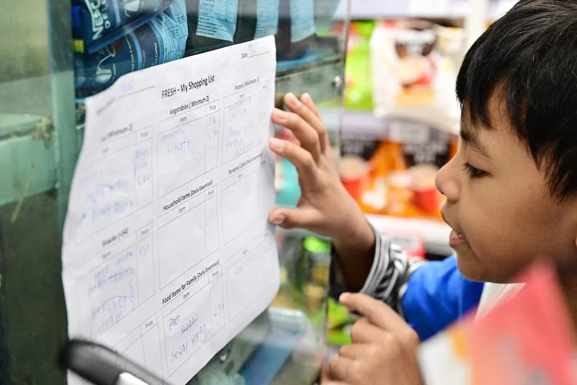 With a $50 budget, students have to put together a shopping list that includes carbohydrates, protein, fruits and vegetables.